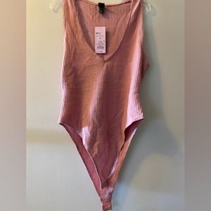 Pink body suit
